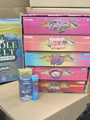 Whole Melts V5 Disposable Vape Cart premium cannabis vape with 10 different flavors including KandyLand and Peach Flambe, Strawberry Fatso